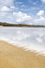 Walk along the salty shores of the Jan Thiel lagoon on the Caribbean island Curacao