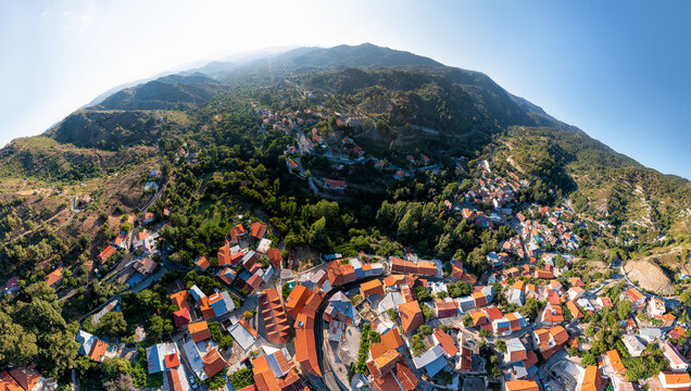 Aerial fish-eye panorama of Fini village, Cyprus - Powered by Adobe