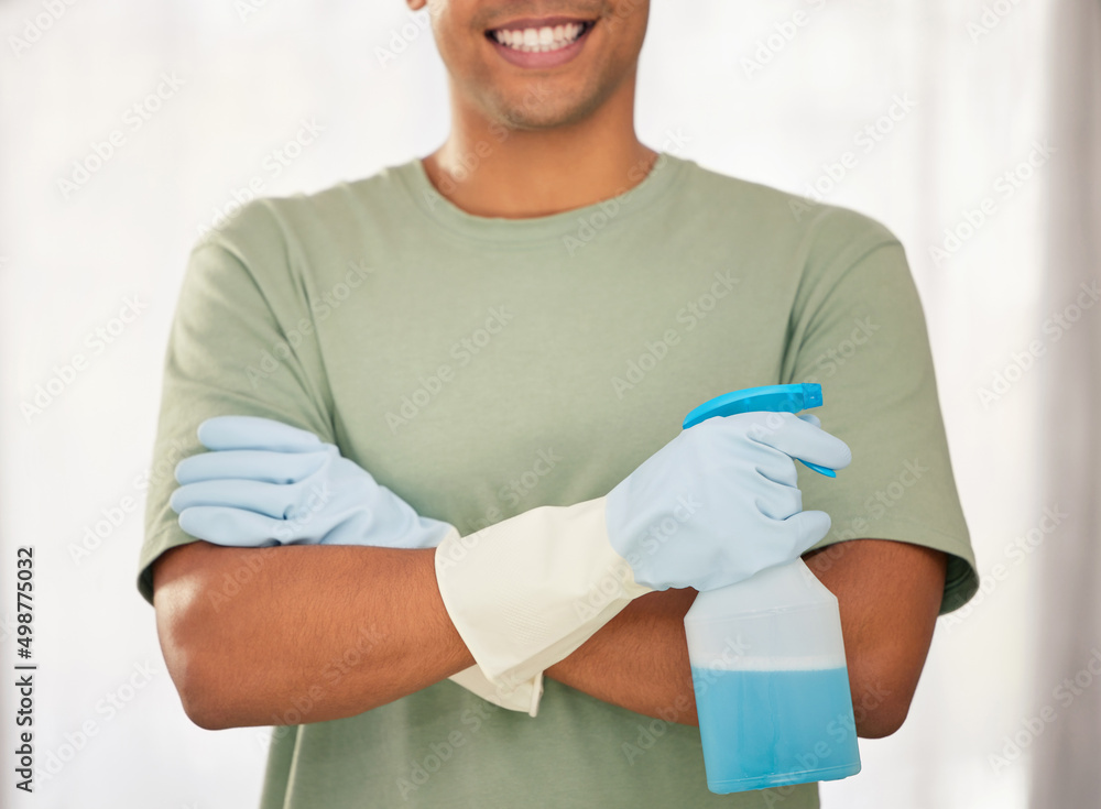 Poster The undisputed master of cleaning. Shot of a man holding a spray bottle of detergent.