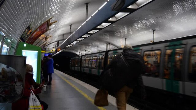 Wide Paris Metro Train Entering Platform