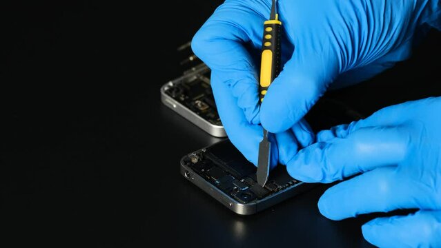 Technician repairing the camera on phone parts and tools for recovery repair phone smartphone and upgrade mobile technology,the concept of computer hardware inside.	