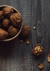 bowl of walnuts on wooden table