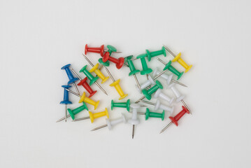 close up of various pushpins on white background with clipping path