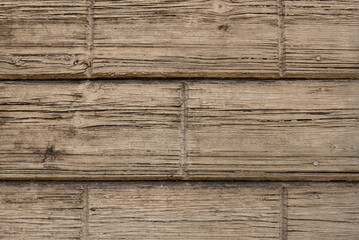 Brown wood texture background coming from natural tree. The wooden panel has a beautiful dark pattern, hardwood floor texture