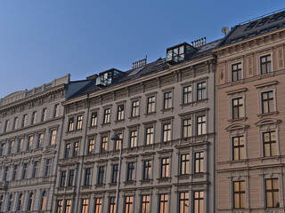 Fototapeta na wymiar View of characteristic old buildings (constructed ca. 1900) in the historic center of city Vienna, Austria in the evening with decorative facades.