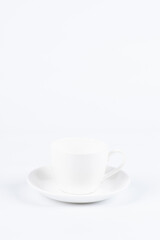 White cup and saucer set
