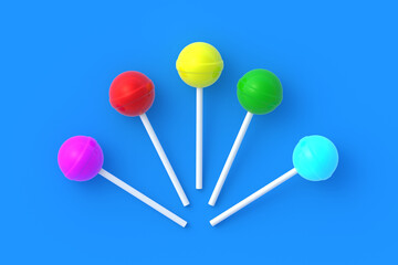 Colorful lollipops on stick on blue background. Sweet candy. Confectionery goods. Top view. 3d render