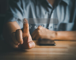 A business man is searching internet on a visual touch screen. Visual or metaverse technology concept.