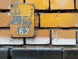 old wall with number