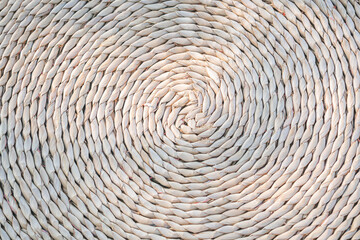 Abstract background of wicker rope circular pattern, rough and gradient light brown texture