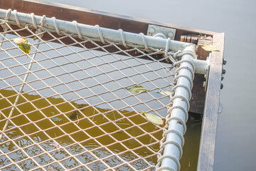 Metal frame with wire netting or mesh for relax seating near the river for recration time