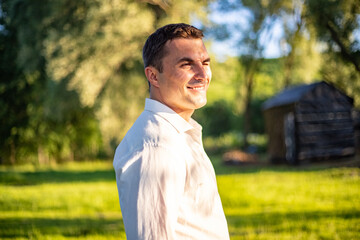 happy groom portrait. boho wedding.