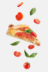 flying slice of margarita pizza with tomatoes and basil