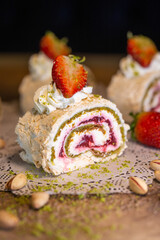 dessert pistachio roll with meringue with cream