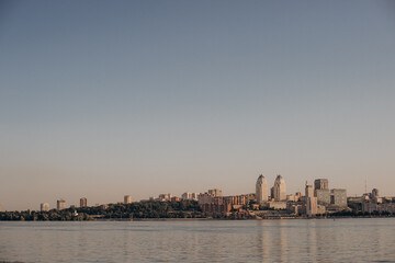 Fototapeta premium view of the right bank of the city Dnipro Ukraine at sunset