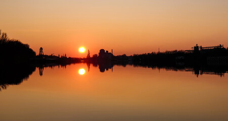 sunset on the lake - industrial zone