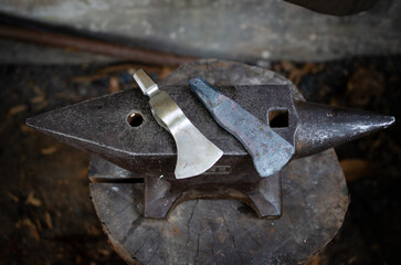 tomahawk axe on anvil