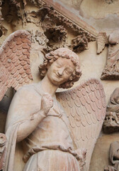 The Smiling Angel, also known as the Smile of Reims, a stone sculpture of the cathedral of Reims 