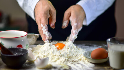 Obraz na płótnie Canvas chef preparing dough