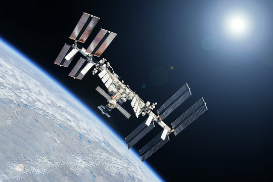 ISS above the earth's surface. Elements of this image furnished by NASA