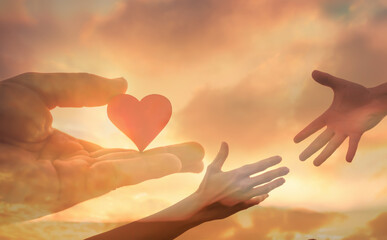 Helping hand. Giving love to someone in need concept. 