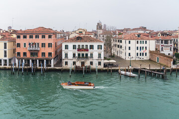 Fototapeta premium canal view and boats in Venice, Italy