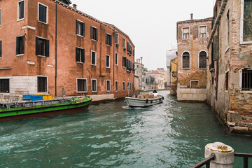 Fototapeta na wymiar Beautiful antique street canal in Venice, Italy 