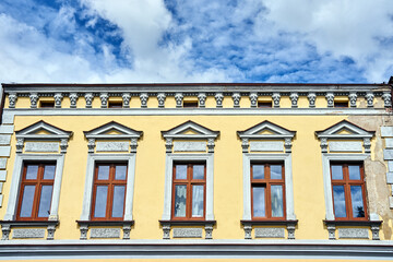 Fototapeta na wymiar Classicist facade of a historic building in the city of Sierakow