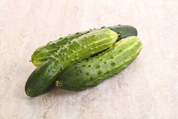 Fersh juicy green cucumbers heap