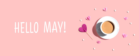 Hello May message with a cup of coffee and paper hearts - flat lay