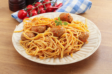Spaghetti with meatball in tomato sause