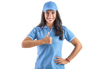 Young attractive woman in blue uniform widely smiling and holding her thumb up in front of her chest. probably working in parcel shop. Isolated background