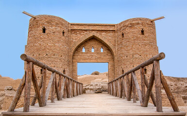 Entrance to the ancient settlement of Otrar, a bridge and a fortress, the ruins of an ancient city,...