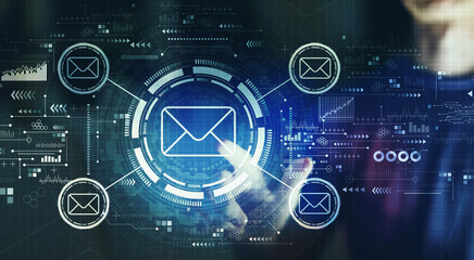 Email concept with young man touching a digital screen at night