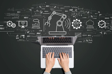 Smart industry concept with person using a laptop computer