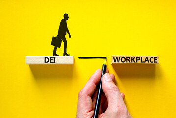 DEI diversity equity inclusion workplace symbol. Blocks with words DEI workplace on beautiful...