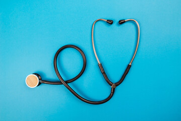 stethoscope isolated on blue background