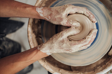 Top Down View of Potter Master at Work in Clay Studio, Handmade Process of Creating Pot on a...
