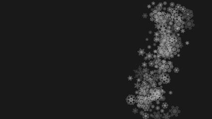 Silver snowflakes frame on black background. Horizontal shiny Christmas and New Year frame for gift certificate, ads, banners, flyers. Falling snow with glitter silver snowflakes for party invite