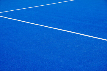 blue artificial grass paddle tennis court