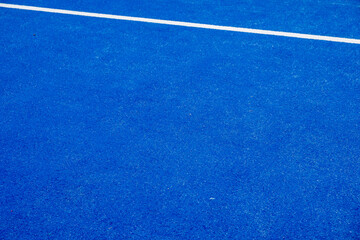 blue artificial grass paddle tennis court