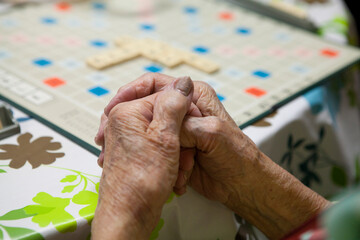 Elderly person playing in a retirement home.