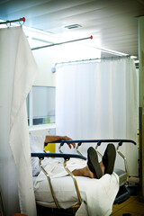 Patient in a night emergency room in a hospital center in France.