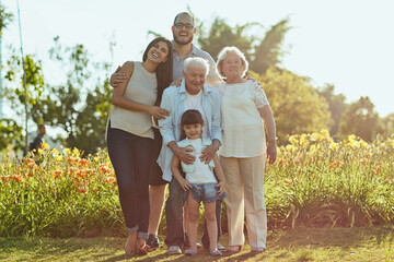 Lifes best blessing Family. Shot of a happy family of three generations spending quality time together in the park. - obrazy, fototapety, plakaty