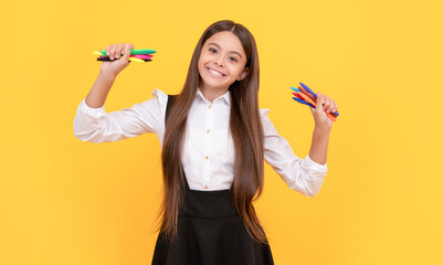 Create a difference. Happy kid hold felt-tip pens. Creative education. Creative skills
