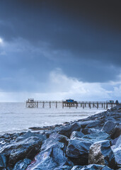 Typical old wooden fishing huts on stilts called « carrelet » in the atlantic ocean near La...