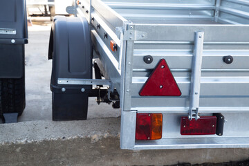 Open car trailer. Trailer for passenger cars.Sale, rental and maintenance of trailers.