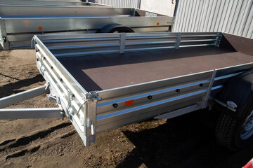 Open car trailer. Trailer for passenger cars.Sale, rental and maintenance of trailers.