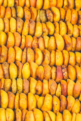 Fototapeta premium The process of home cooking dried fruits in an electric dryer.