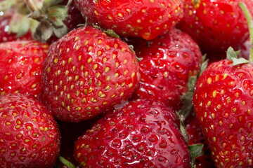 Strawberries as background top view. Strawberries close up. Juicy berries picked for dessert.